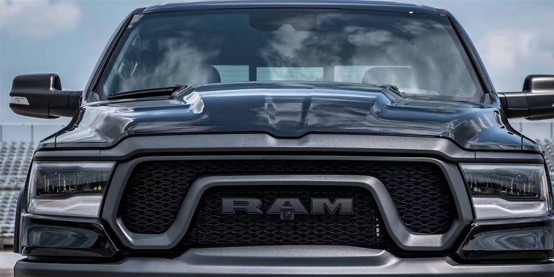 A closeup of the front end of a black RAM 1500